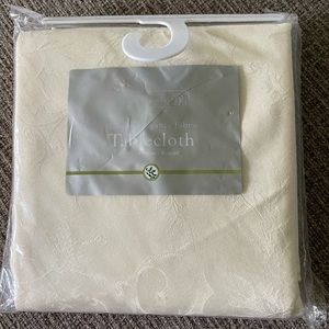 Ivory colored 70” round table cloth